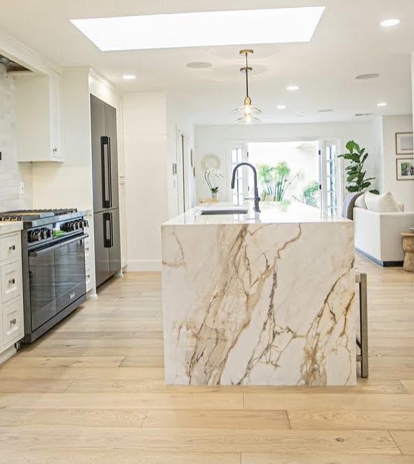 Kitchen with marble waterfall island